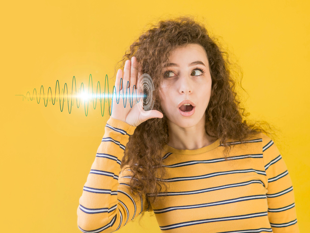 woman having hearing problems